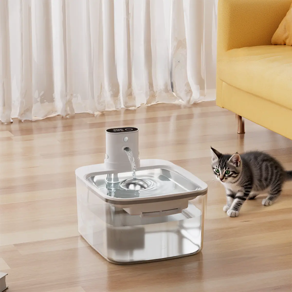 Automatic pet water fountain with flowing water, attracting a curious tabby cat.