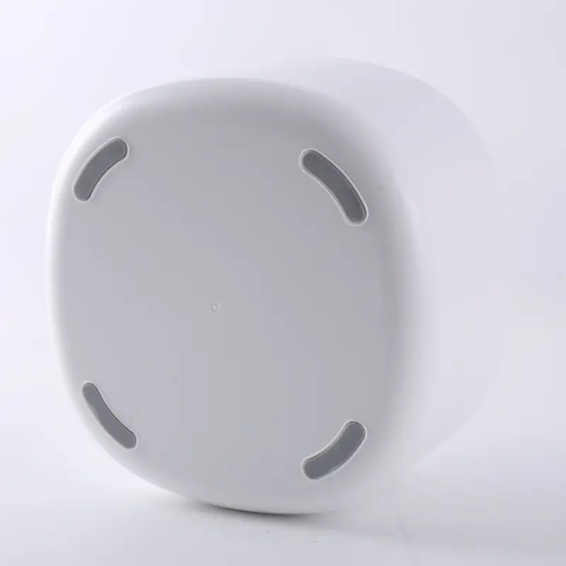 White pet water fountain base with four gray anti-slip rubber strips.