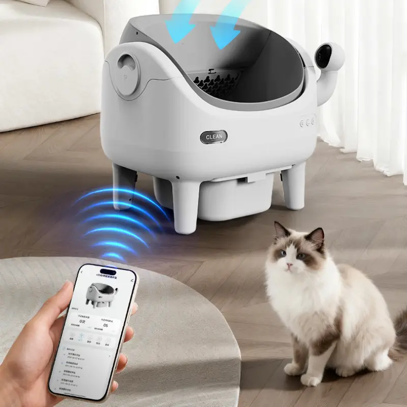 Smart self-clean cat litter box with APP remote control & smart sensors, a cat nearby in a bright modern living room