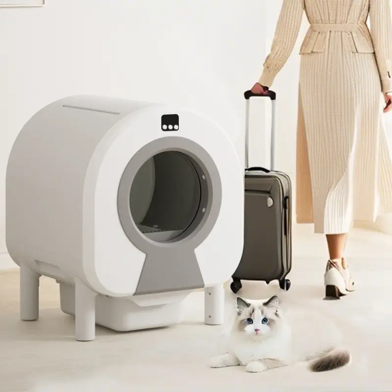 White enclosed smart cat litter box in a modern home with a cat and a traveler.