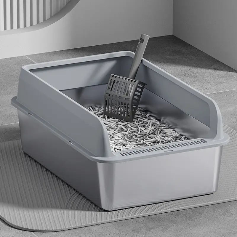 Stainless steel cat litter box with matching scoop, modern gray design for easy cleaning.